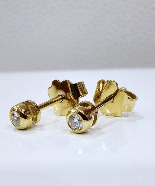 EARRINGS 18KT/0.06CT/VSG
