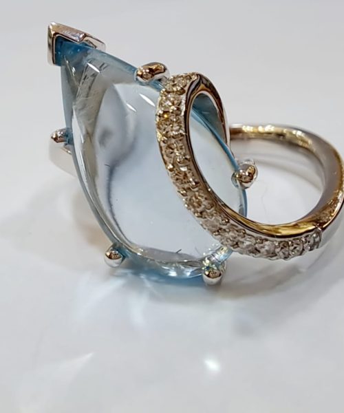 RING 18KT/ VSG 0.10CT/ BLUE TOPAZ