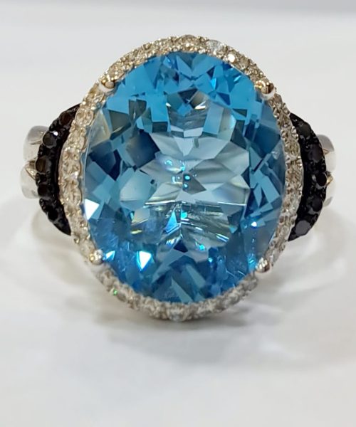 RING 18KT/ 0.09CT VSG/ BLUE TOPAZ